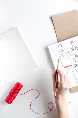 desktop designer clothes with tools top view mock upの写真素材