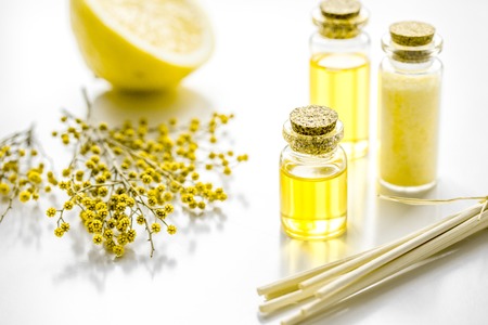 Home cosmetic set with organic essential oil and sea salt on white backgroundの写真素材