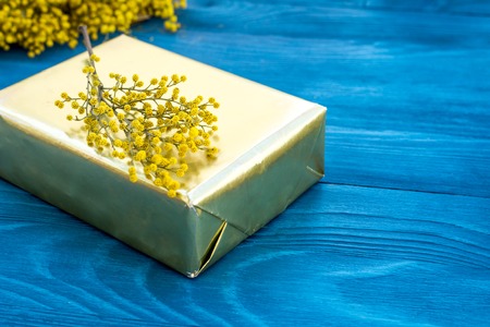 concept gift flowers on wooden table mock upの写真素材