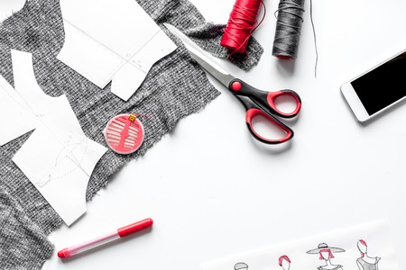 desktop designer clothes with tools top view mock upの写真素材