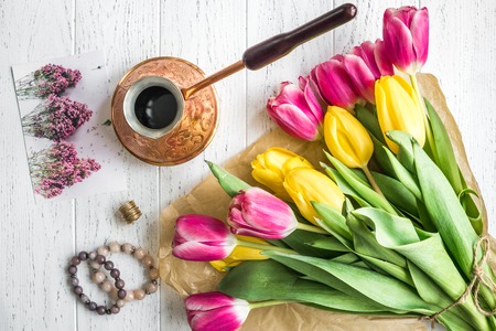 flowers spring tulips top view on wooden backgroundの写真素材