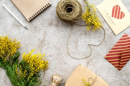 concept International Women Day with flowers on stone background top view mock upの写真素材