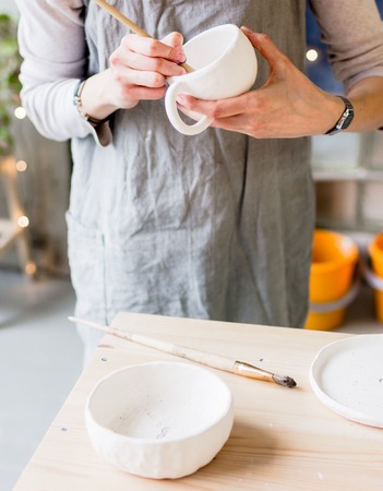 workshop production of ceramic tableware product paintingの写真素材