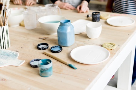 workshop production of ceramic tableware product paintingの写真素材