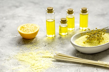 Bodycare cosmetic set with oils and sea salt on gray backgroundの写真素材