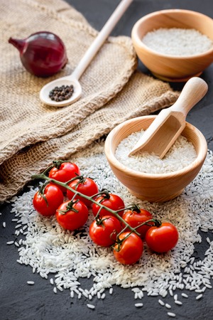 ingredients for paella on dark backgroundの写真素材