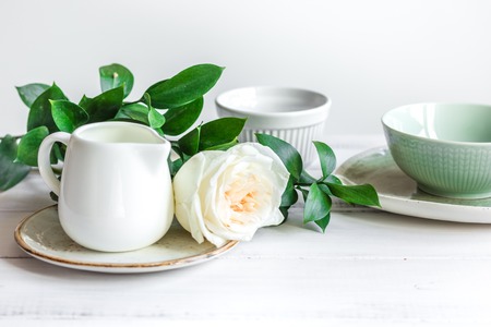 ceramic tableware with flowers on white backgroundの写真素材