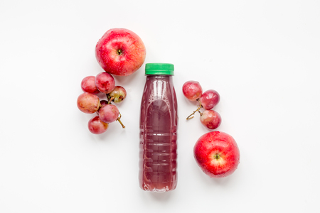 plastic bottles with fruit drinks on white background top view mock-upの写真素材