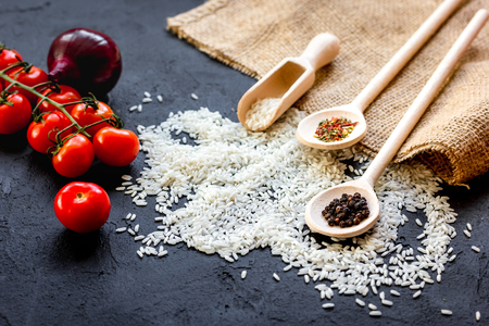 ingredients for paella on dark backgroundの写真素材
