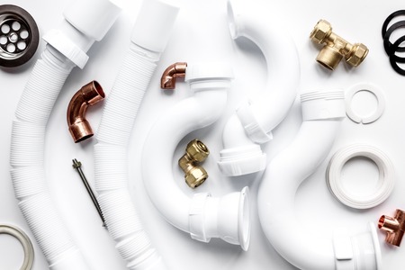 concept plumbing work top view on white backgroundの写真素材