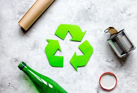 Eco concept with recycling symbol on table background top view mockupの写真素材