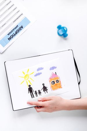 family concept with children drawing on desk background top view mock up
