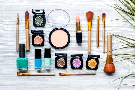 Beauty and fashion concept with decorative cosmetics on table background top viewの写真素材