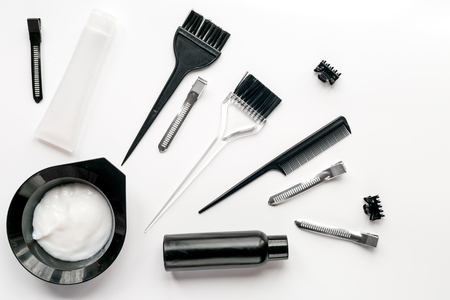hairdresser woorking desk with tools on white background top viewの写真素材