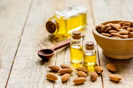 organic cosmetic with almond extract on table backgroundの写真素材
