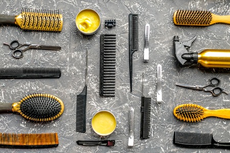 Tools for hairdress in barbershop on gray background top viewの写真素材