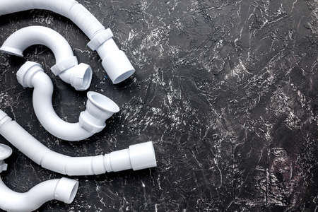 concept plumbing work top view on dark background.の写真素材