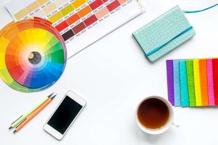 professional creative graphic designer desk on white background top view mock upの写真素材