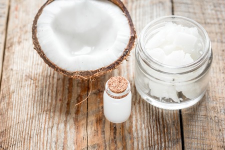 organic cosmetics concept with coconut on table backgroundの写真素材
