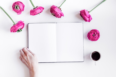 Modern spring design with flowers on white background top view moke upの写真素材