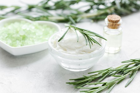 organic cosmetics with rosemary extract on stone table backgroundの写真素材