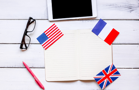 lifestyle learning english online on white wooden table background top viewの写真素材