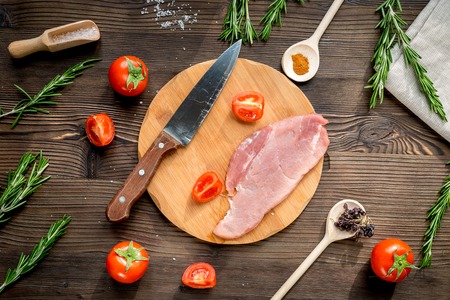 restaurant kitchen with steak preparing on wooden background top viewの写真素材