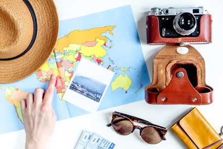 traveller set with camera and map on white background top viewの写真素材