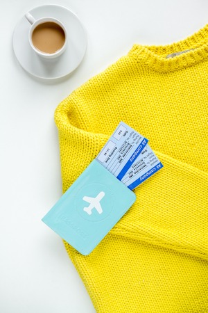 traveller set with coffee and passport on white background top viewの写真素材