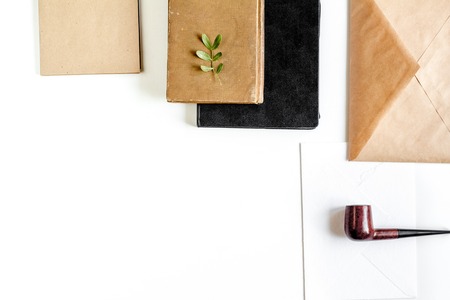 Writer workplace with tools on white background top view mock up