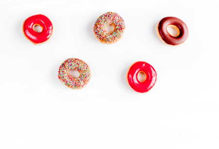 food design with donat set on white table background top view mockupの写真素材