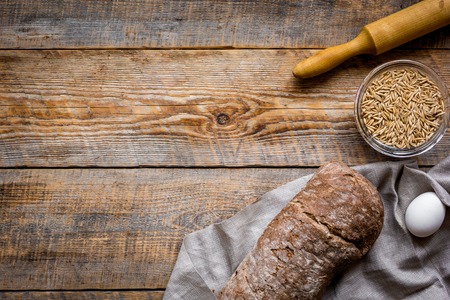 Baking bread ingredients on wooden table background top view mockupの写真素材