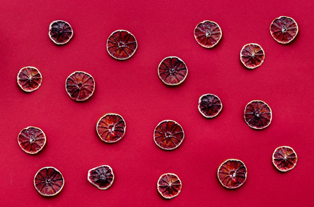 romantic dinner in red color with cut blood orange top view patternの写真素材