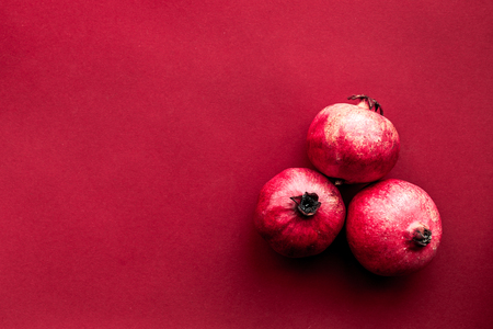 red set with cut pomegranate for restaurant menu top view mock-upの写真素材