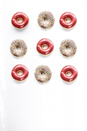 food design with donat set on white table background top view mockupの写真素材