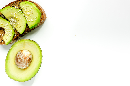 making healthy lunch with bread and avocado kitchen top view mock upの写真素材