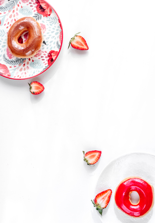 food design with donat on plate white table background top view mockupの写真素材