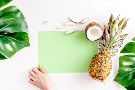 sliced coconut and pineapple in exotic summer fruit design white background top view mock-upの写真素材