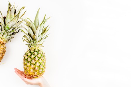 summer mockup with pineapple on white table background top viewの写真素材