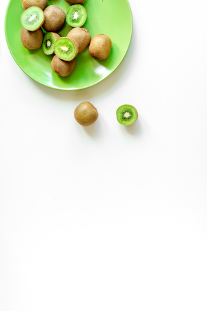 fresh green fruits with kiwi on white background top view mock-upの写真素材
