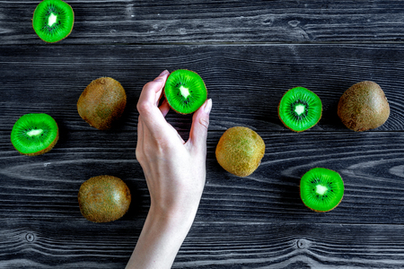 kiwi for healthy fruit dessert on dark table background top viewの写真素材