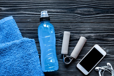 concept preparing to fitness sports equipment top view on wooden backgroundの写真素材