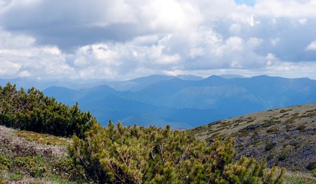 Summer mountain landscape. View of the hills and meadows on Lake Baikal, Russiaの写真素材