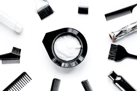 hair dye with brush on white table background top viewの写真素材