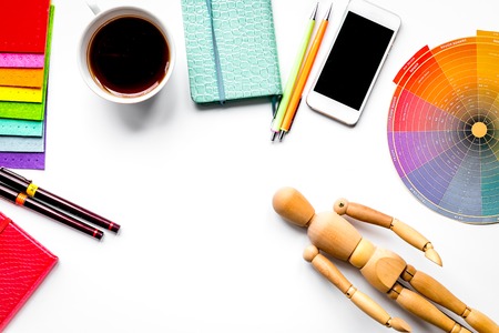 graphic tools, coffee and mobile in designer concept on white background top view mock up