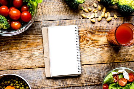 concept diet, slimming plan with vegetables top view mock upの写真素材