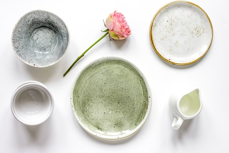 ceramic tableware top view on white background mock up.の写真素材