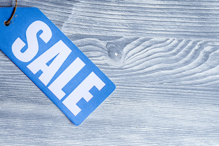 concept of sale on wooden background top viewの写真素材