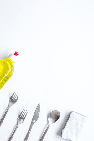 concept of washing dishes on white background top viewの写真素材