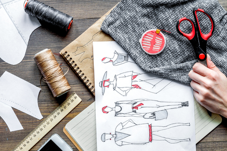 desktop designer clothes with tools top view mock upの写真素材